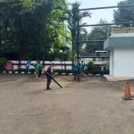 proses pembersihan lahan sebelum memulai proyek pengaspalan
